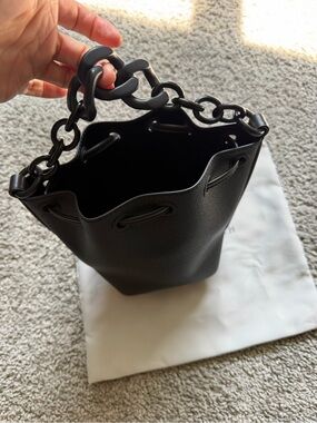 Charles & Keith Black Leather Bucket Bag with Chain Handle and Adjustable Strap
